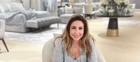 Haley Kiarash in front of Novart furniture