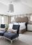 48 - Sissy Yellen, Elegant bedroom interior featuring a custom upholstered headboard, floral wallpaper accent wall, velvet accent chairs, modern pendant lighting, and a neutral and blue color scheme with luxurious bedding and a sophisticated seating area.