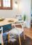 20 - GHK | Dining Wishbone Chair Shot with Cowhide Rug